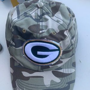 Green Bay packer hat . Camouflage, sequins around letter G